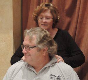 Robbie Fouts receives a shoulder message from Kim Murphy