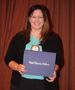 Elizabeth Karbousky receiving her Paul Harris Fellow